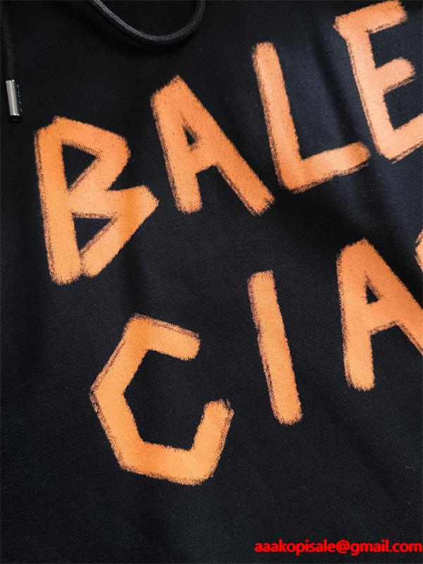 バレンシアガ コピー パーカー ホワイト オレンジロゴ 手書き風 プリントデザイン カジュアル ストリート BALENCIAGA