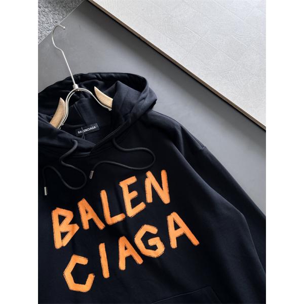 バレンシアガ コピー パーカー ホワイト オレンジロゴ 手書き風 プリントデザイン カジュアル ストリート BALENCIAGA