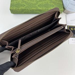 GUCCI コピー ラウンドファスナー長財布 ドナルドダック GGスプリーム キャンバス N級品 グッチ 