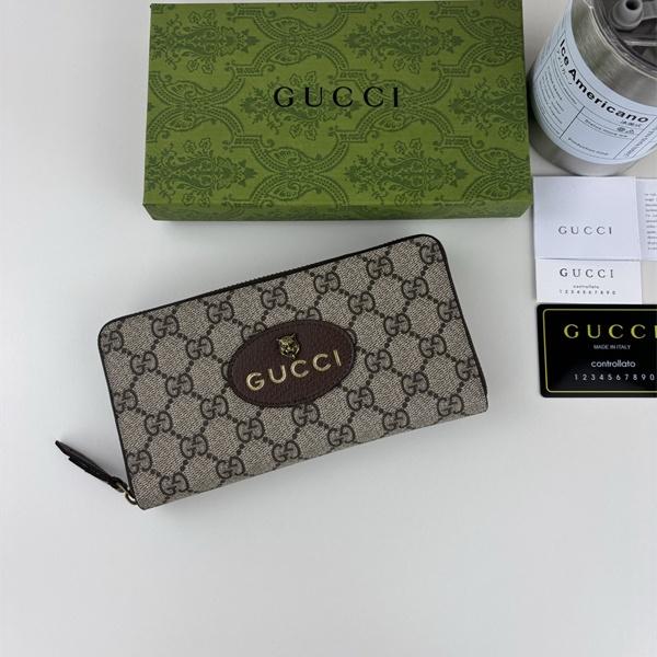 GUCCI コピー 長財布 GGスプリーム ブラウンレザー オーバルロゴ 高級感 上品 スタイリッシュ グッチ