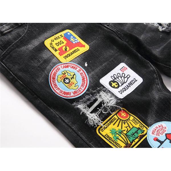  ディースクエアード ブラック 多種バッジ ダメージ デニムパンツ DSQUARED2 コピー 秋冬 ボリューム感ある 注目