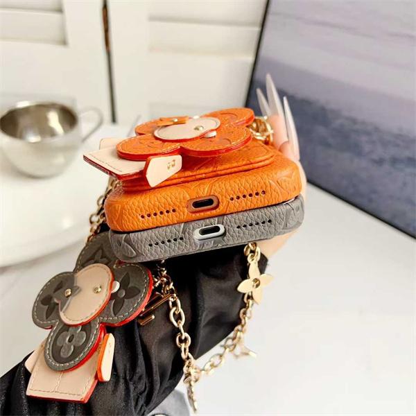 ルイヴィトンLV激安カラープレス郵差カードポケット太陽花チャーム付きiPhone17ケース