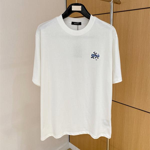 アミリ コピー ワンポイン AMIRI トロゴ 半袖Tシャツ クロスモチーフ ホワイト ブラック クルーネック シンプルボディ