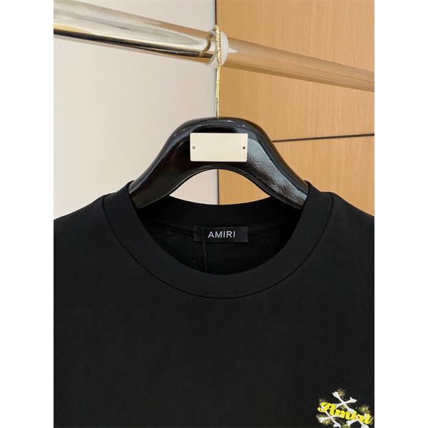アミリ コピー ワンポイン AMIRI トロゴ 半袖Tシャツ クロスモチーフ ホワイト ブラック クルーネック シンプルボディ