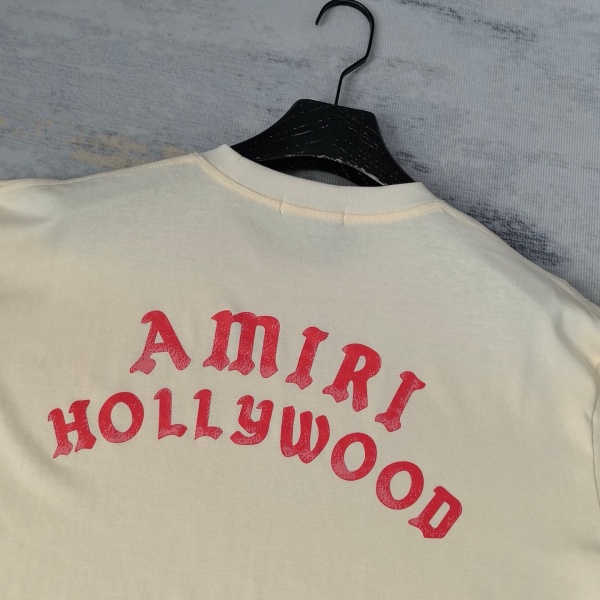 AMIRI アミリ 半袖Tシャツ バックロゴプリント カーブロゴデザイン ルーズシルエット カジュアル ストリート ユニセックス