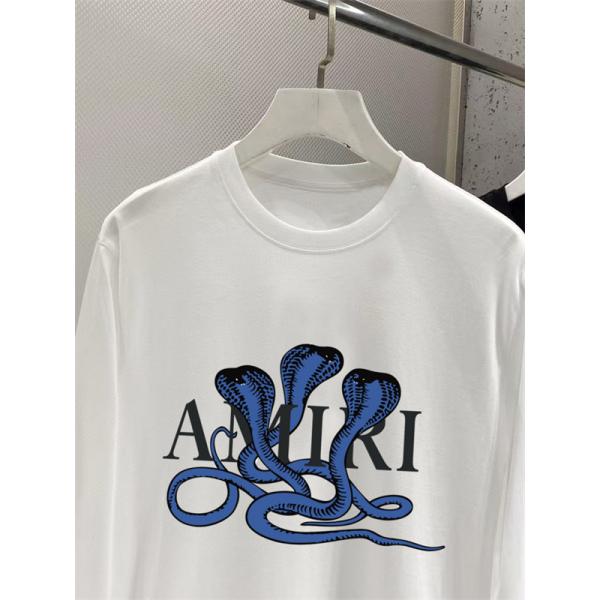 蛇モチーフが際立つ AMIRI アミリ コピー ロングスリーブTシャツ ロゴオーバーレイ ダークアート