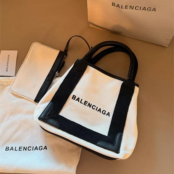 通勤コーデに映える BALENCIAGA バレンシアガ コピー ハンドバッグ ロゴキャンバス 端正トートフォルム